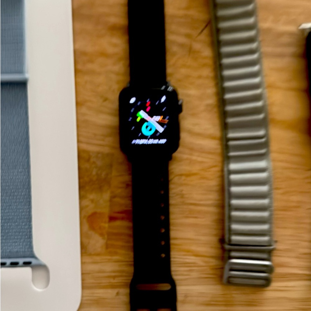 Like new I watch by Apple with four bands in black 38 mm